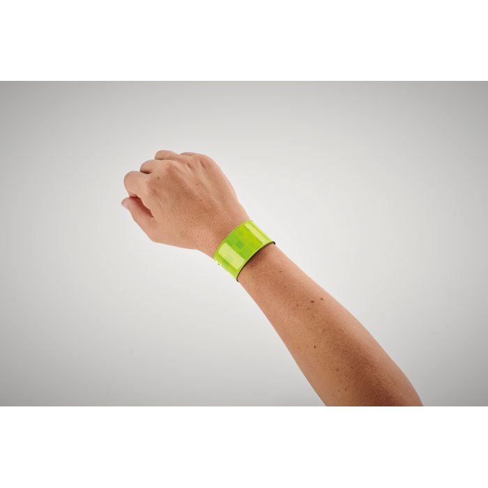 ENROLLO + - Reflektierendes Snap Armband mit karierter Oberflache und silberner oder gelber Reflexfolie (CE EN17353).